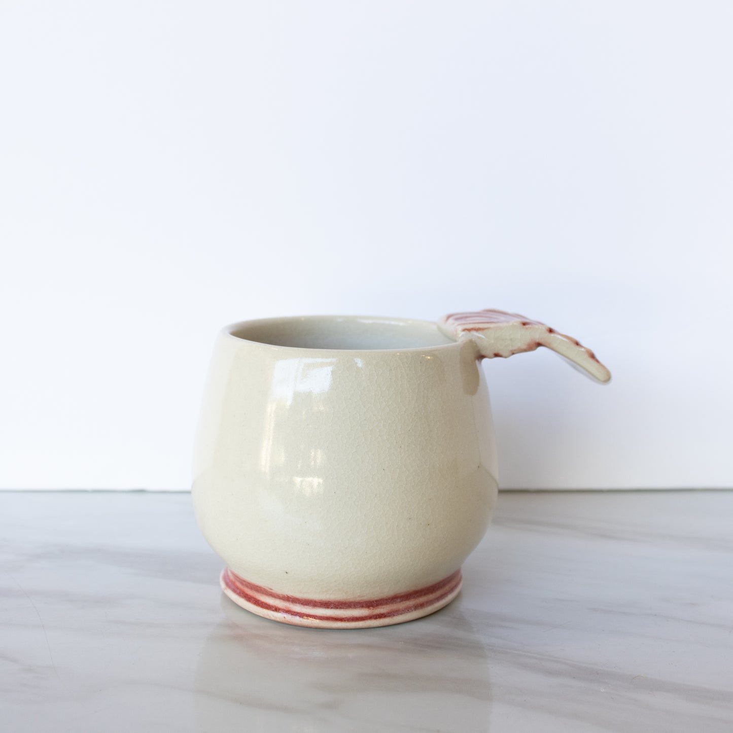 Louise Schollaert - Red and White Cup with Textured Handle